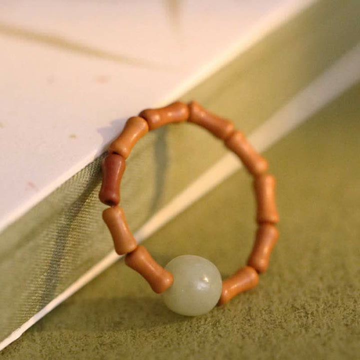 Anillo de suerte de prosperidad de bambú con cuentas de jade hetiano