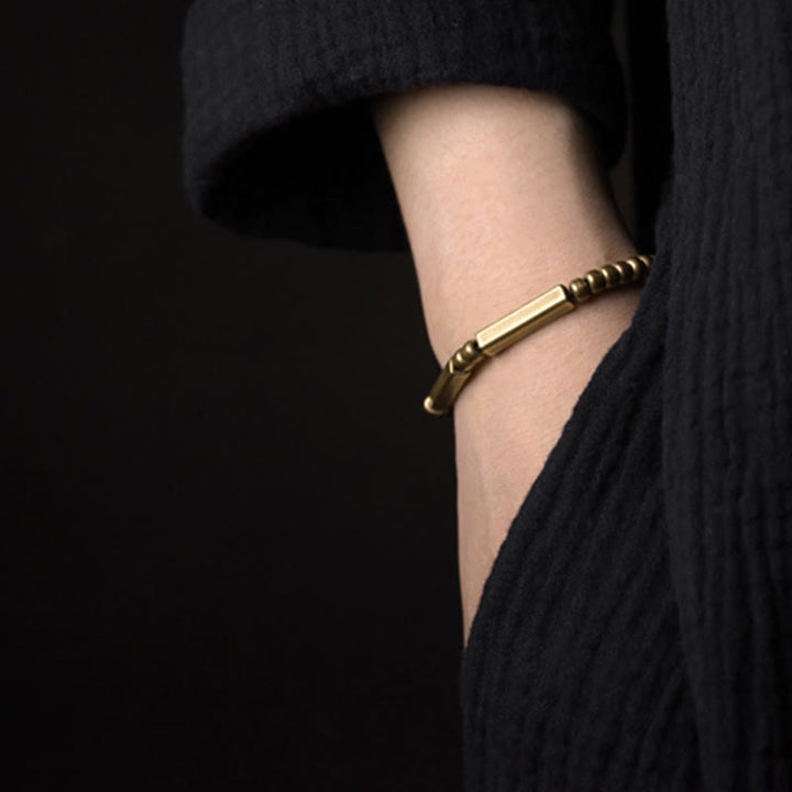 Pulsera de la suerte de la riqueza del cobre del diseño simple tibetano de las Buddha Stones