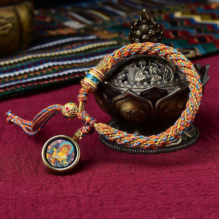 Pulsera de cuerda tejida con dije de rueda de oración Thangka de la suerte hecha a mano tibetana con Buddha Stones