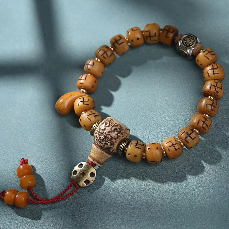 Buddha Stones, hueso de camello tibetano Natural, esvástica, cuentas Dzi, amuleto de Buda Shankha, Kirtimukha, pulsera con borla de protección de la suerte