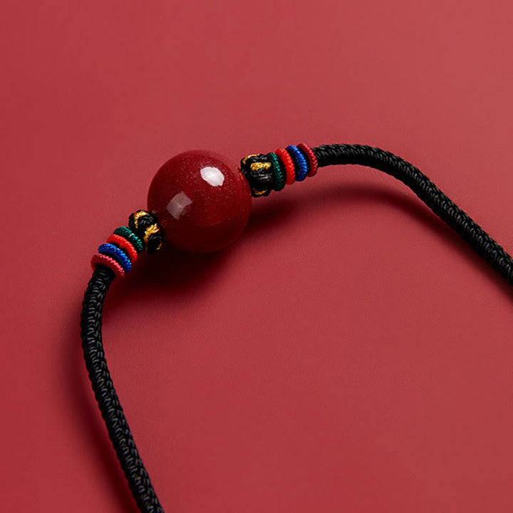 Collar con colgante de cadena con cuentas de cinabrio y Buddha Stones