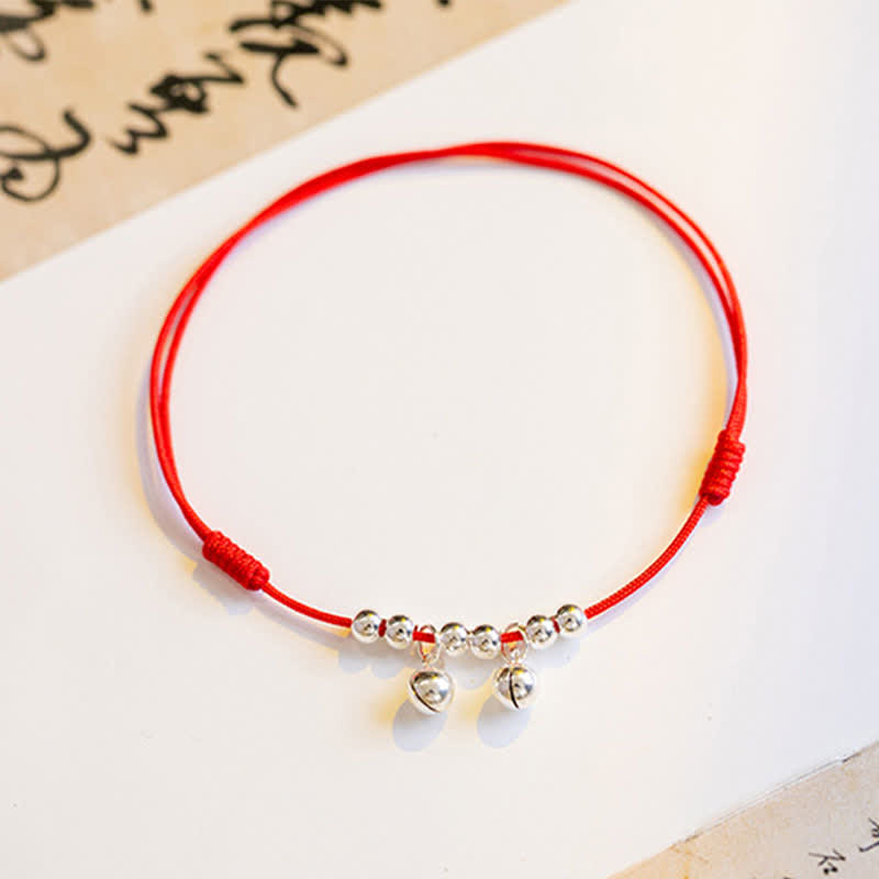 Tobillera con dije de campana trenzada con hilo rojo de plata de ley 925 con Buddha Stones