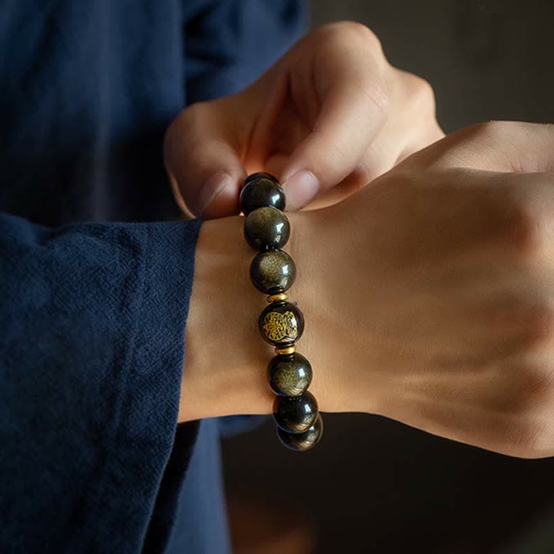 Pulsera de protección de la riqueza de obsidiana con brillo dorado del Buda Natal del zodíaco chino