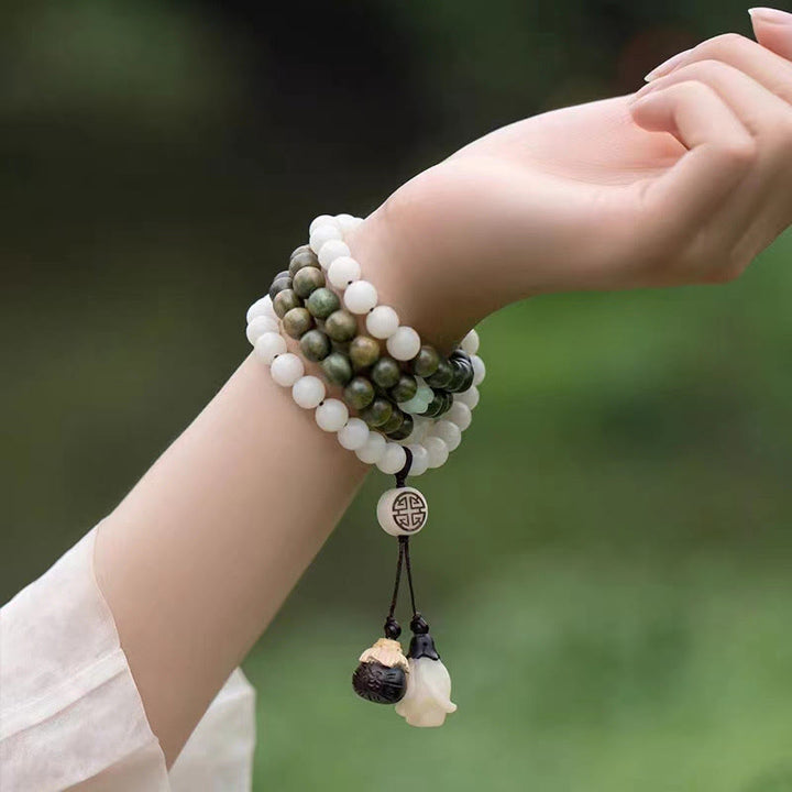 Pulsera calmante de semillas de Bodhi de sándalo verde natural con Buddha Stones