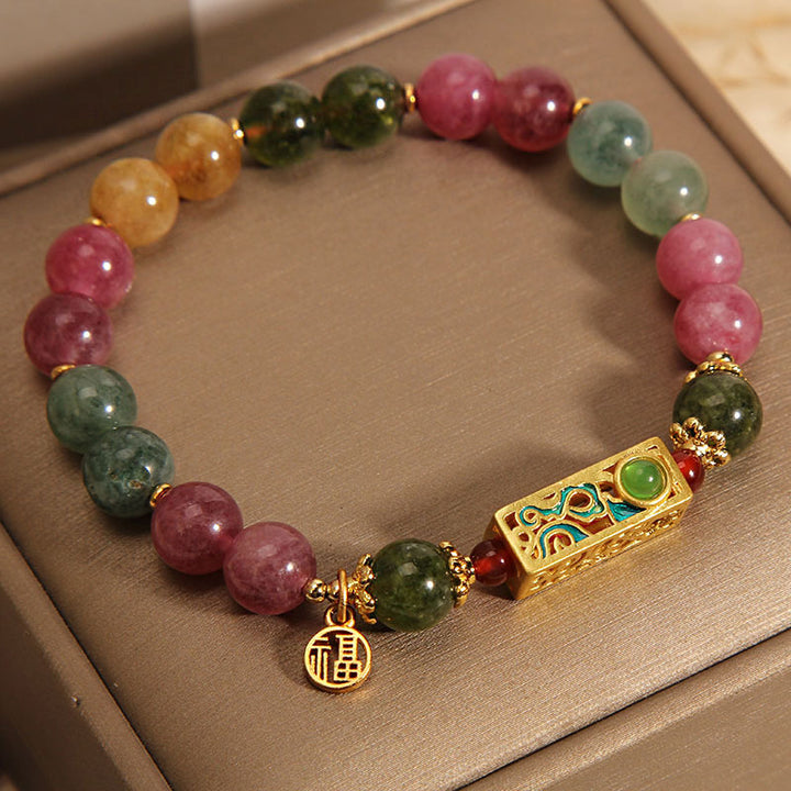 Pulsera con dije de personaje Fu positivo de turmalina colorida con Buddha Stones