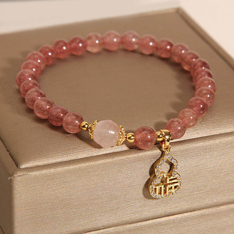 Pulsera positiva con dije de personaje Fu de calabaza de cuarzo fresa con Buddha Stones