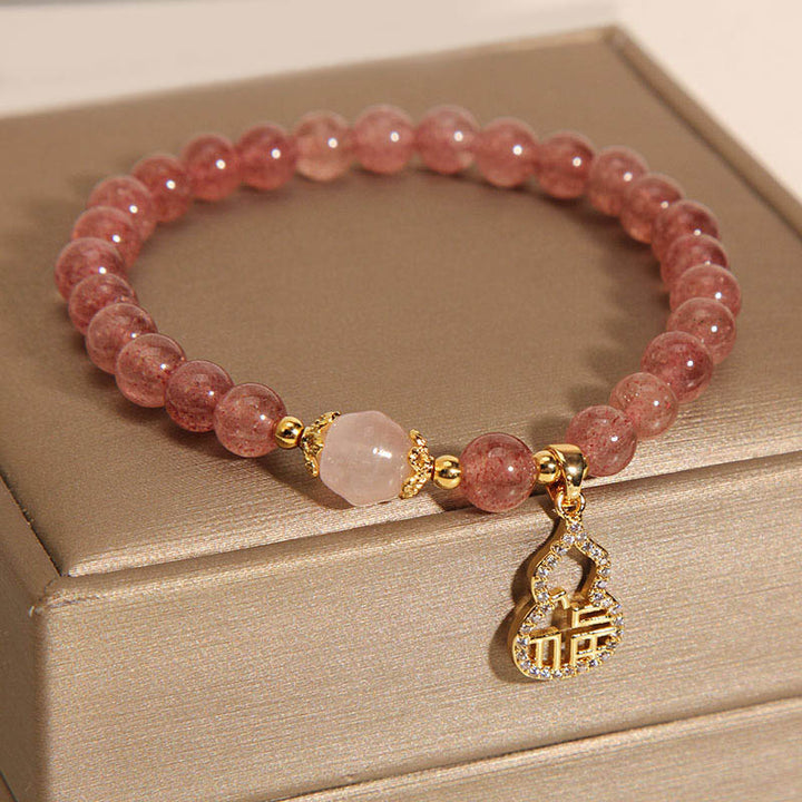 Pulsera positiva con dije de personaje Fu de calabaza de cuarzo fresa con Buddha Stones