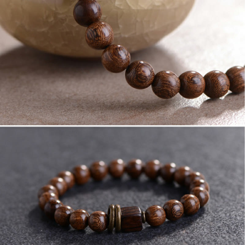 Pulsera de espiritualidad de madera de Phoebe Zhennan con Buddha Stones