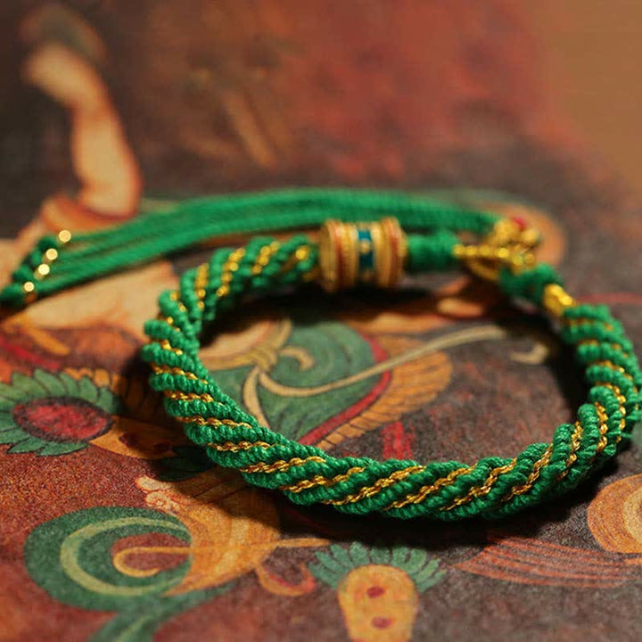 Pulsera de cuerda tejida con dije de rueda de oración Thangka de la suerte hecha a mano tibetana con Buddha Stones