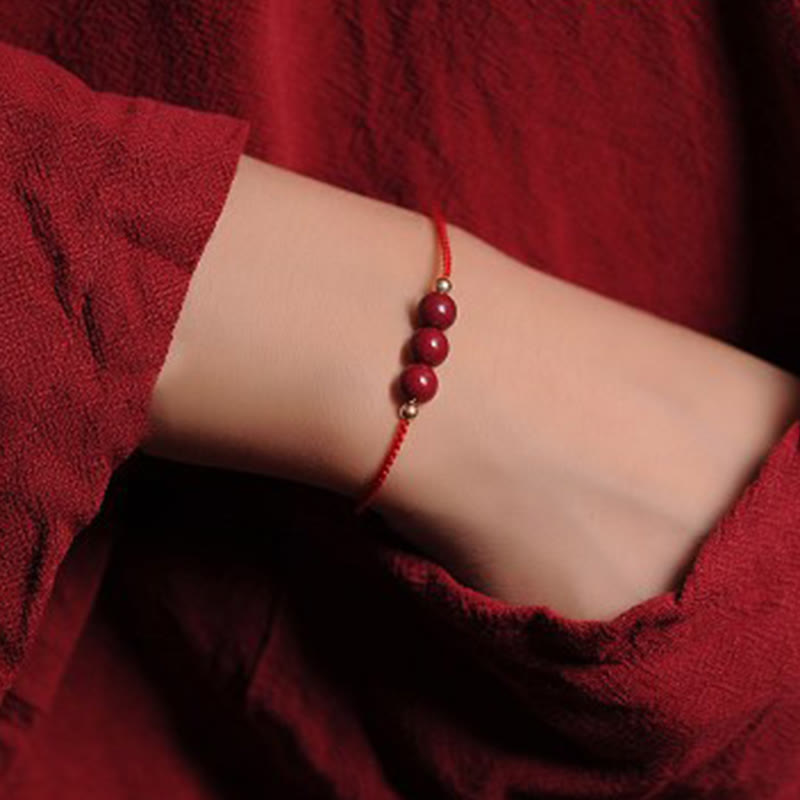 Pulsera trenzada con cadena de bendición de cinabrio natural chapada en oro de 14 quilates con Buddha Stones