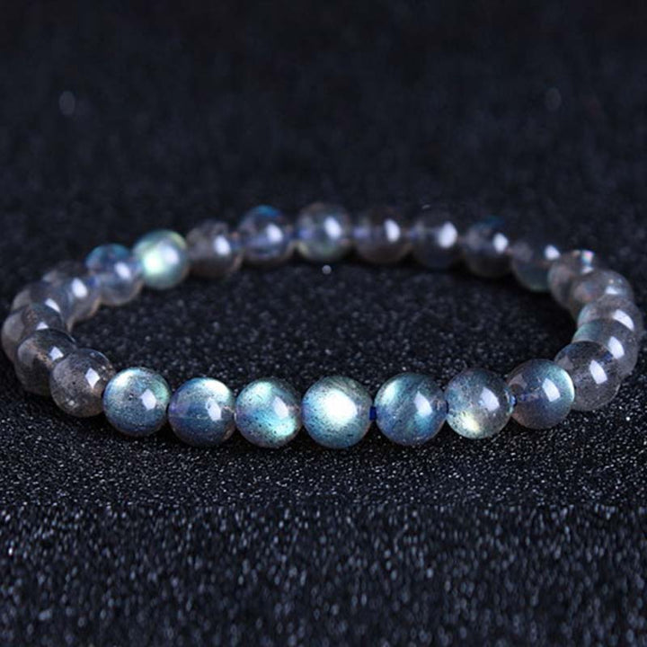 Pulsera de cuentas curativas de piedra lunar natural de piedras de Buddha Stones - image 7