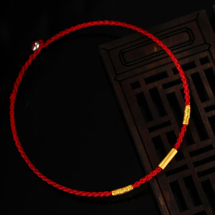 Pulsera de protección trenzada con nudos de los deseos de cuatro hilos hecha a mano con cuentas de oro 999 de Buddha Stones
