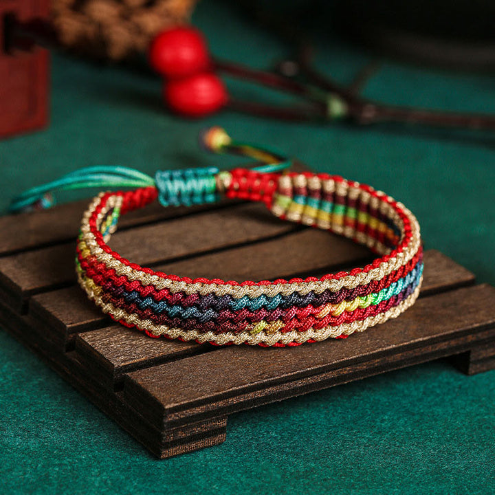 Pulsera de hilo trenzado con protección multicolor de arcoíris hecha a mano con Buddha Stones del Tíbet