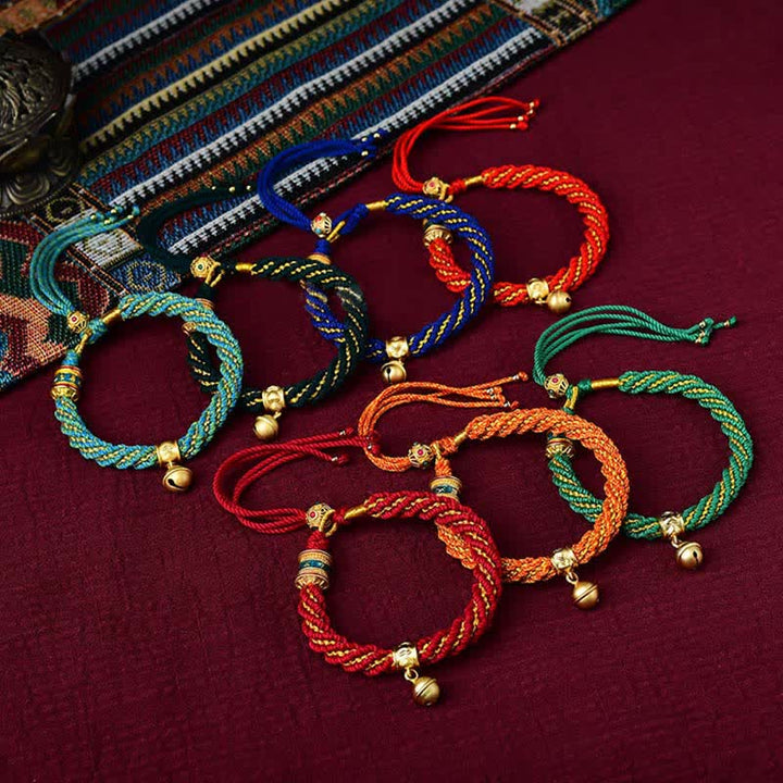 Pulsera de cuerda trenzada con dije de campana y rueda de oración Thangka de protección de la suerte hecha a mano tibetana