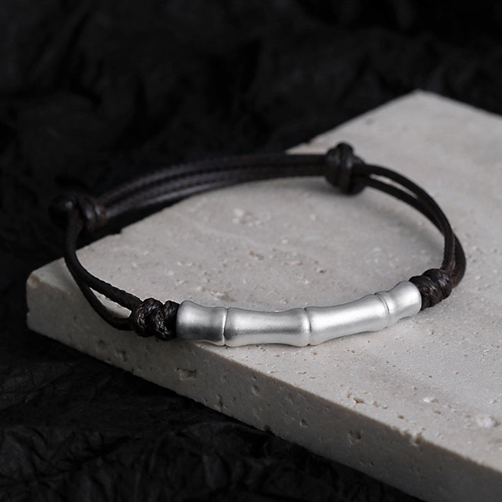 Pulsera trenzada de cuerda de la suerte con patrón de hueso de plata de ley 999 con Buddha Stones