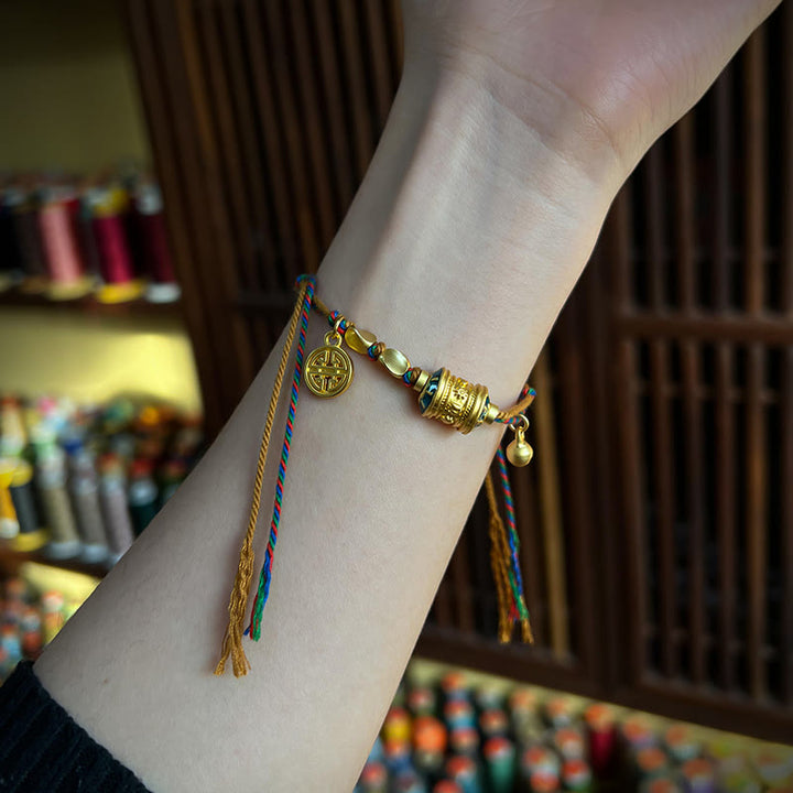Pulsera de cuerda de fuerza de protección de rueda de oración Om Mani Padme Hum hecha a mano tibetana con Buddha Stones