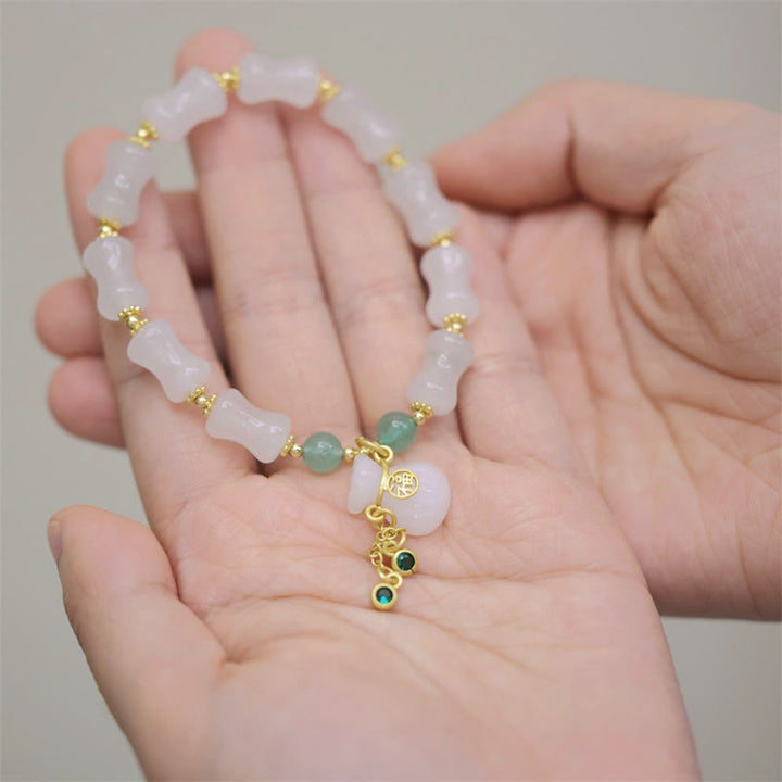 Buddha Stones Natural blanco dorado seda Jade bambú patrón riqueza suerte bolsa Fu personaje pulsera