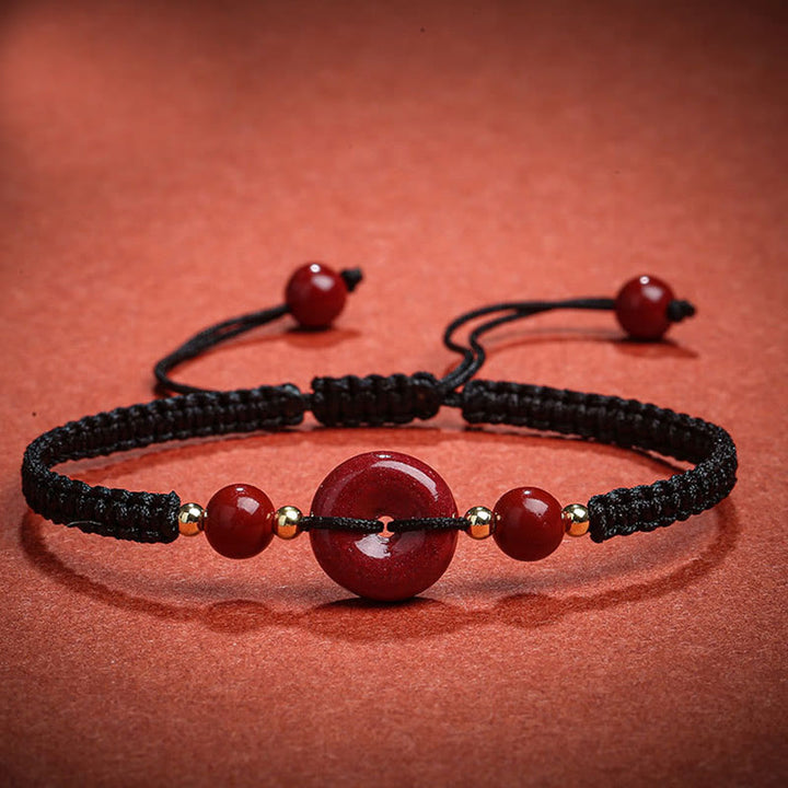 Pulsera de cuerda de bendición con hebilla de paz de cinabrio natural con Buddha Stones