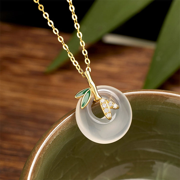 Colgante positivo del collar de la hebilla de la paz de la hoja de bambú de la calcedonia natural de la plata esterlina de las Buddha Stones