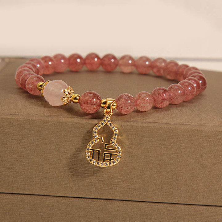 Pulsera positiva con dije de personaje Fu de calabaza de cuarzo fresa con Buddha Stones