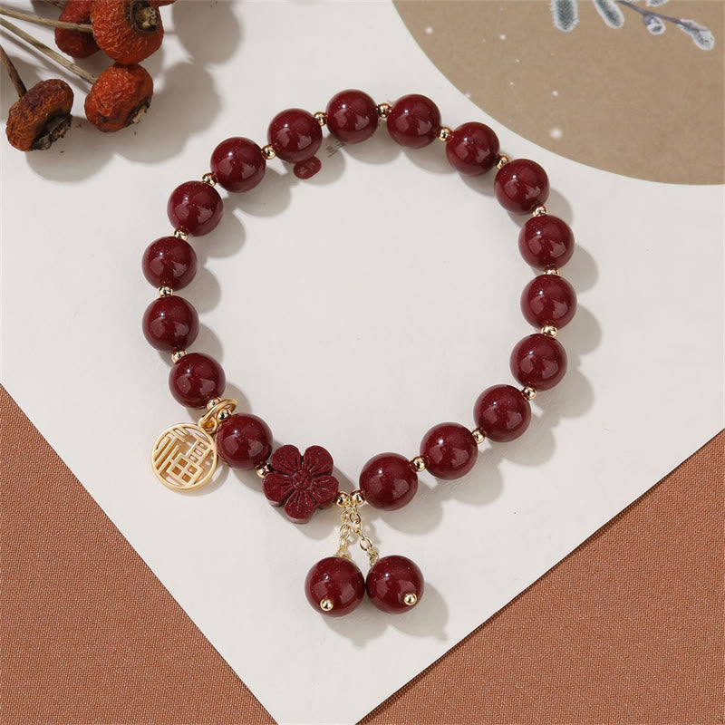 Pulsera de bendición de flor de cerezo con personaje de cinabrio de Buddha Stones