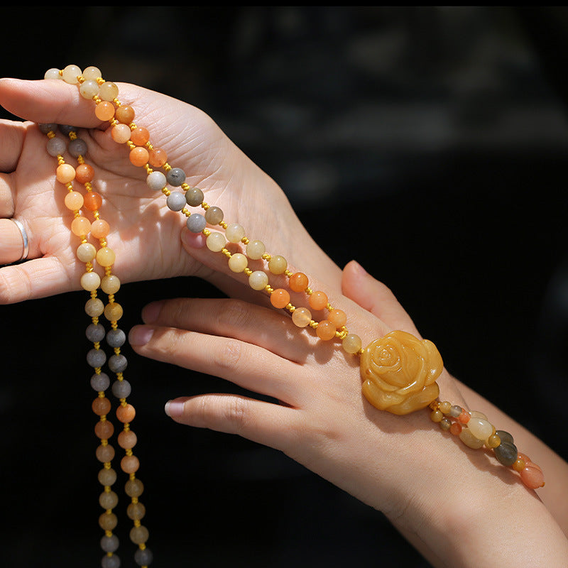 Collar con colgante de riqueza de jade de seda dorada tibetana con Buddha Stones