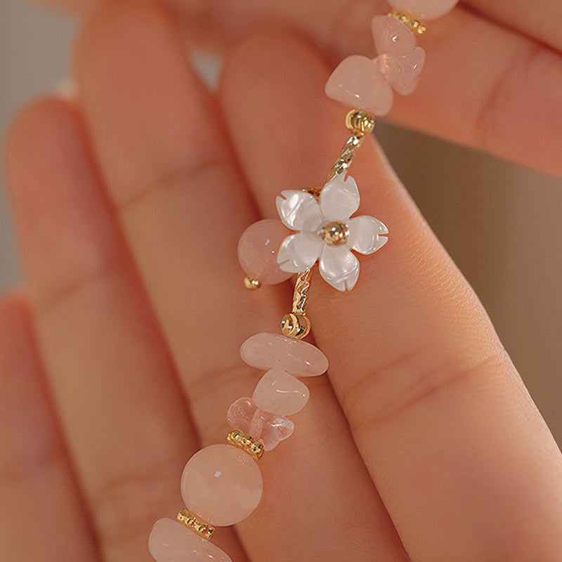 Pulsera de amor con flor de cristal rosa natural chapada en oro de 14 quilates con Buddha Stones