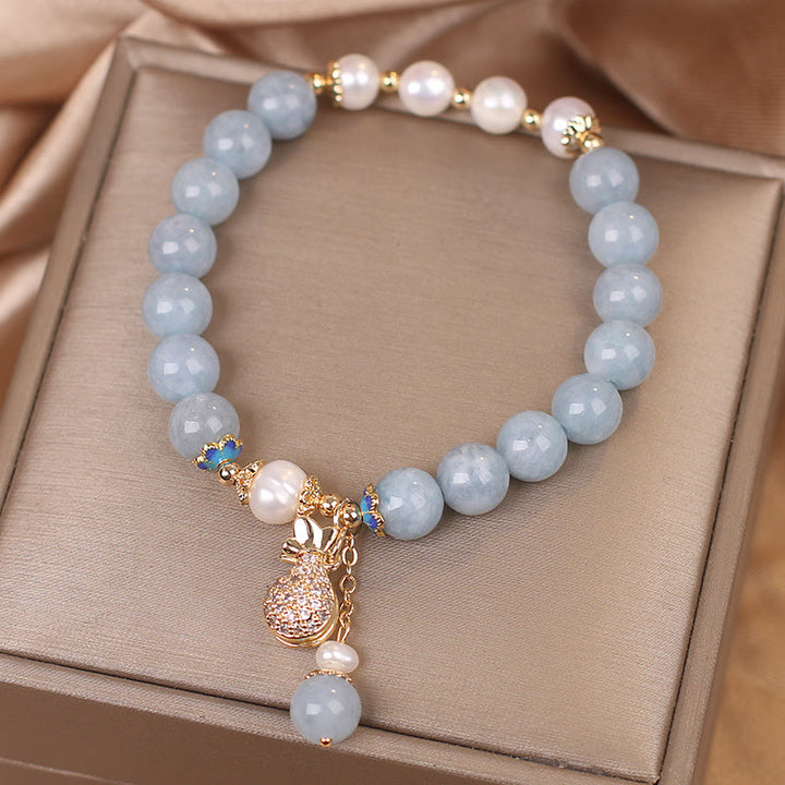 Pulsera con dije para bolsa de dinero con perlas de aguamarina y Buddha Stones