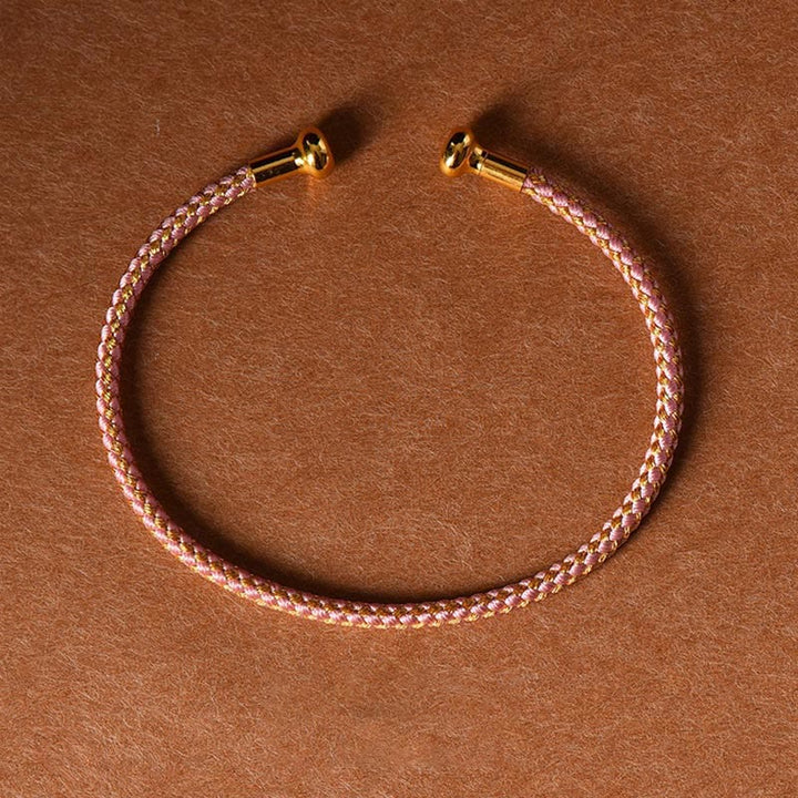 Pulsera de cuerda trenzada de la suerte hecha a mano con diseño simple de Buddha Stones