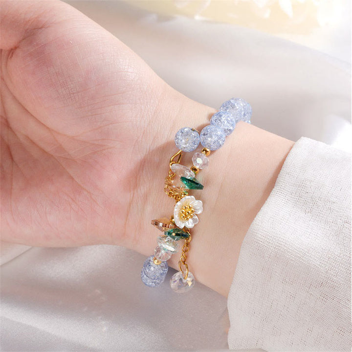 Pulsera de cuentas de cristal con dije de flor de diseño simple con Buddha Stones