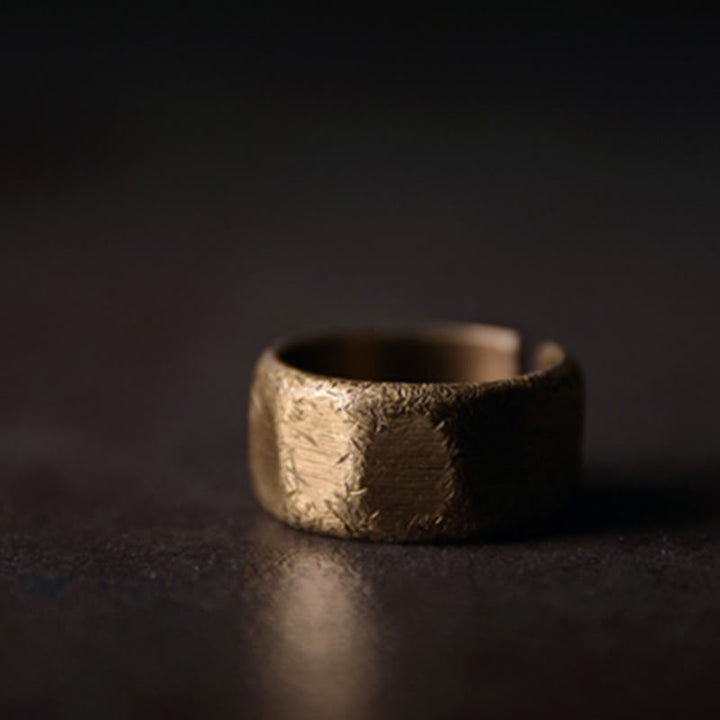 Anillo de riqueza esmerilado de latón y cobre de diseño simple tibetano