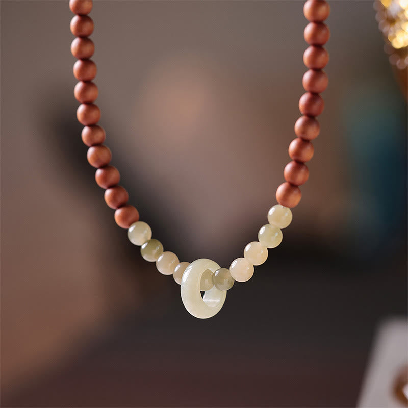 Pulsera de doble vuelta con protección de jade hetiano de sándalo y Buddha Stones