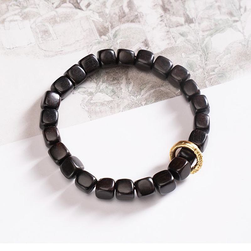 Pulsera de equilibrio de cuentas Dzi de madera de ébano tibetano con Buddha Stones