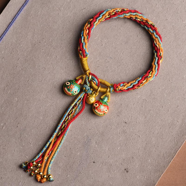 Pulsera de cuerda colorida trenzada con nudo de reencarnación de la familia de la bestia tragadora de oro con Buddha Stones