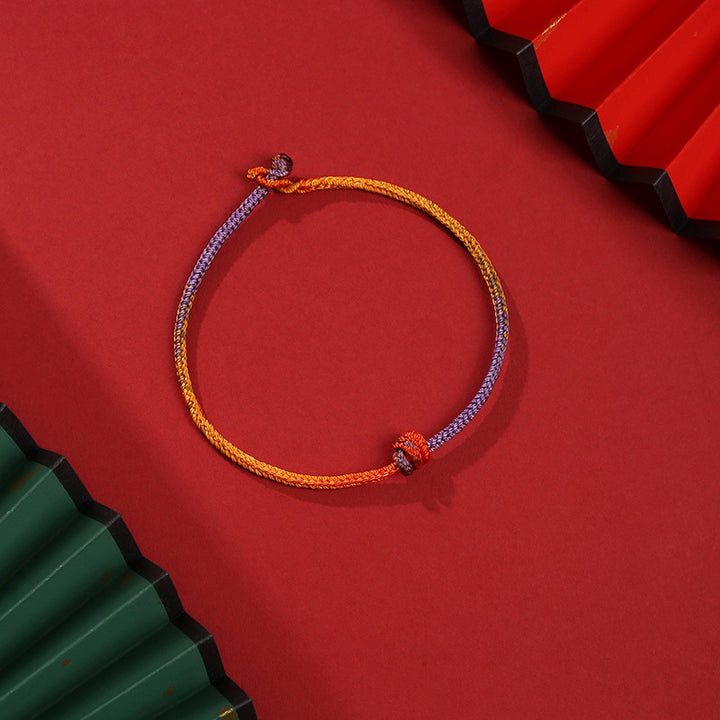 Pulsera de cuerda trenzada roja de oro púrpura colorida hecha a mano con Buddha Stones
