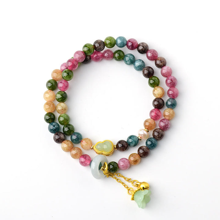 Pulsera con dije de lirio de los valles de doble envoltura de sabiduría de calabaza de turmalina multicolor con Buddha Stones