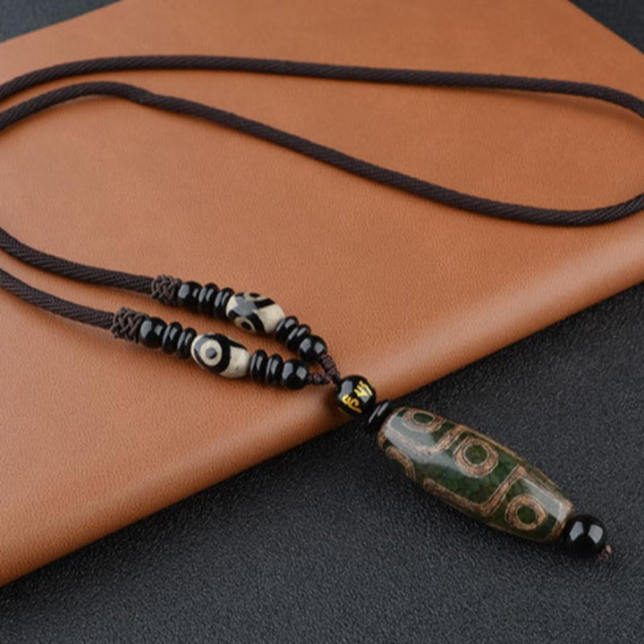 Collar de protección de la riqueza con cuentas Dzi de nueve ojos y Buddha Stones
