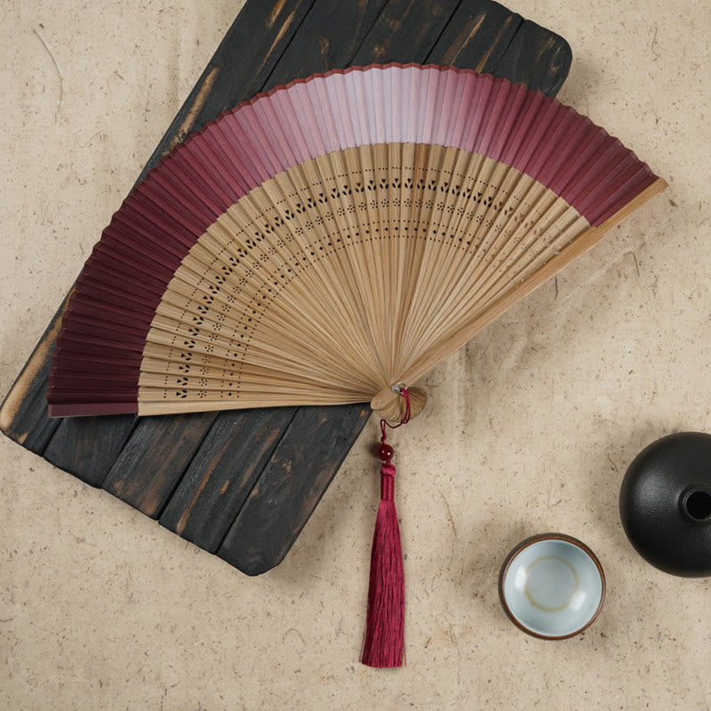 Abanico plegable de bambú de mano grabado hueco degradado de Color sólido con Buddha Stones