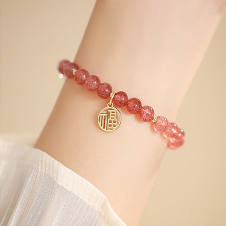 Pulsera con dije curativo de personaje Fu de cuarzo fresa chapado en oro de 14 quilates con Buddha Stones