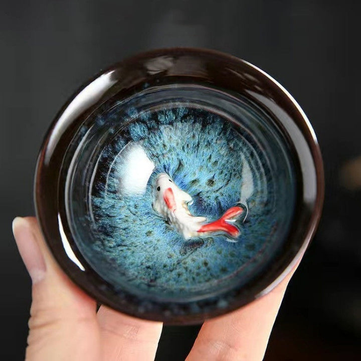 Buddha Stones, pequeño pez Koi, cambio de horno azul, taza de té de cerámica china Jianzhan, taza de té de Kung Fu 75ml