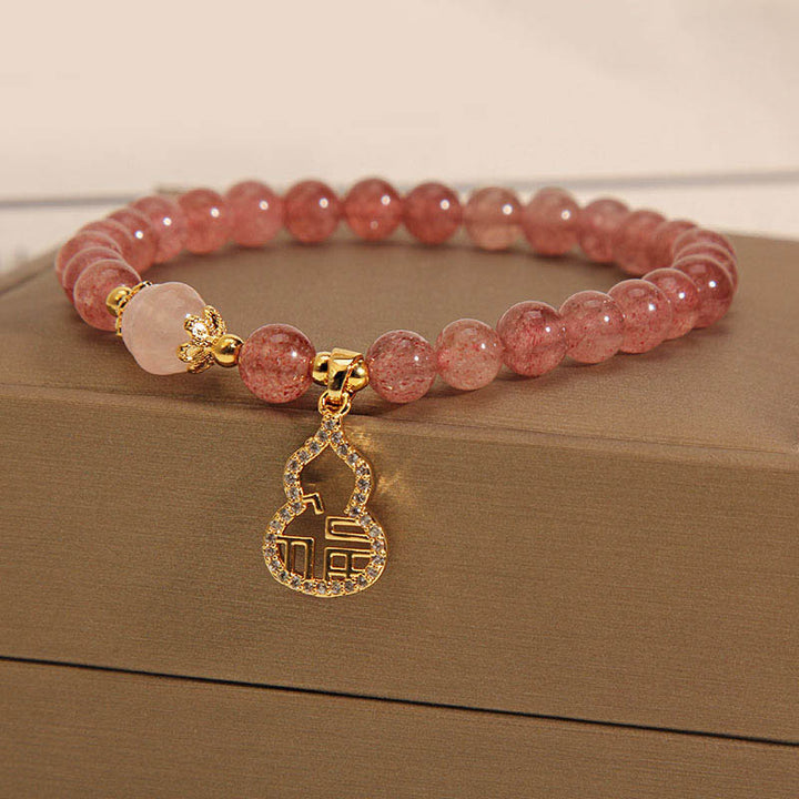 Pulsera positiva con dije de personaje Fu de calabaza de cuarzo fresa con Buddha Stones