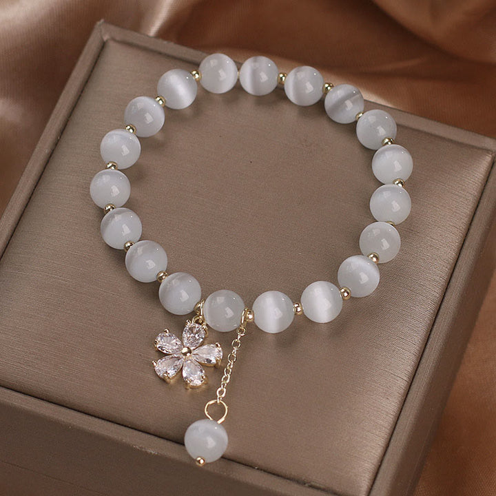 Pulsera de apoyo a la paz con dije de flor de ojo de gato y Buddha Stones