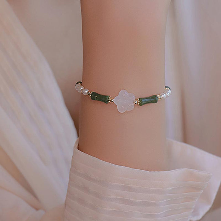Pulsera de la paz con perlas y ágata, flor de bambú, peridoto y Buddha Stones