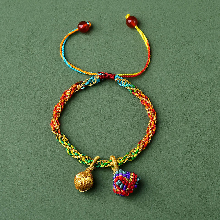Pulsera con dije de bola dorada Zongzi hecha a mano con cuerda colorida y Buddha Stones