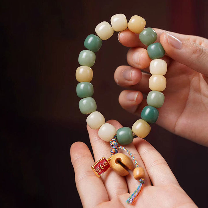 Pulsera con dije de tambor de pez de madera con semillas de Bodhi, gradiente Natural, Buddha Stones