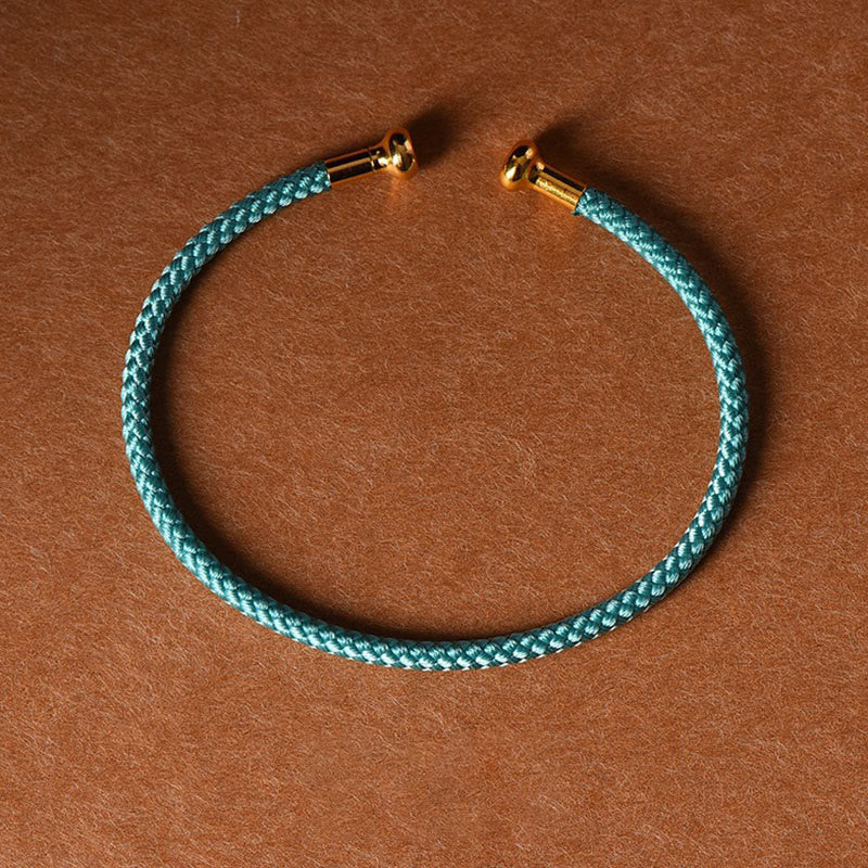 Pulsera de cuerda trenzada de la suerte hecha a mano con diseño simple de Buddha Stones