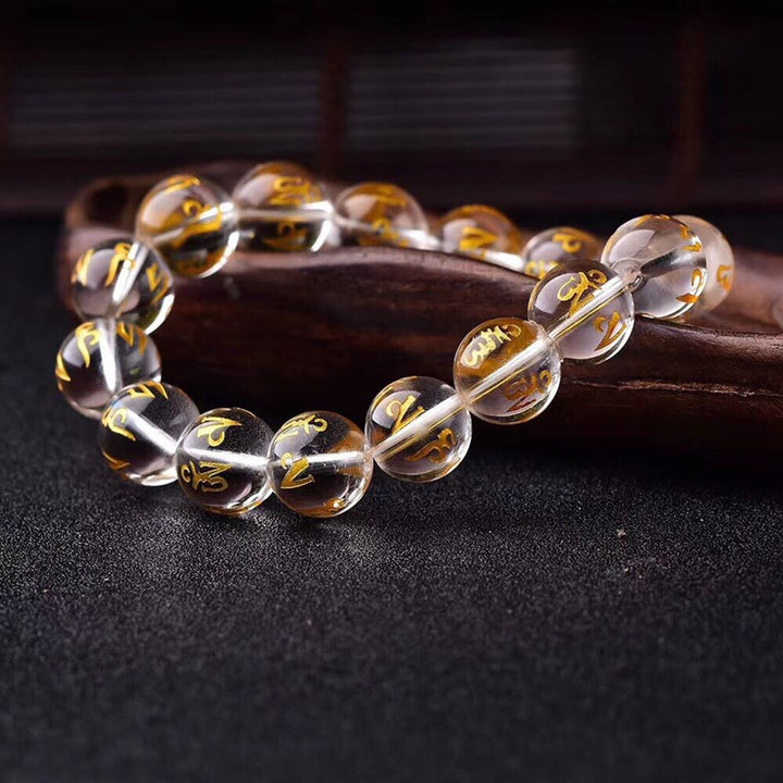 Pulsera de meditación Om Mani Padme Hum de ónix negro y cristal blanco del Tíbet con Buddha Stones