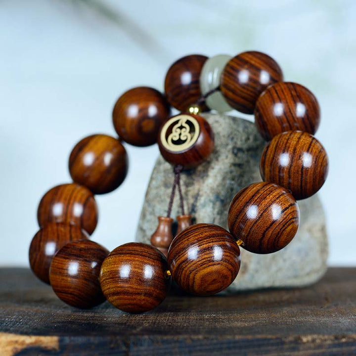Pulsera con dije de Buddha Stones, palisandro, calidez, calma