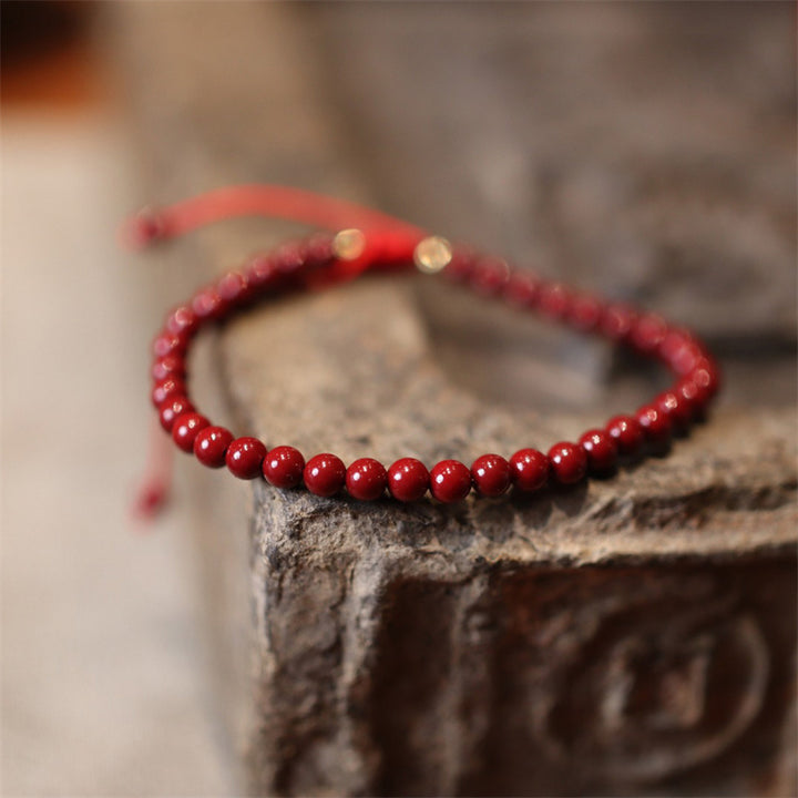 Pulsera tobillera trenzada con hilo rojo con bendición de cinabrio natural con Buddha Stones