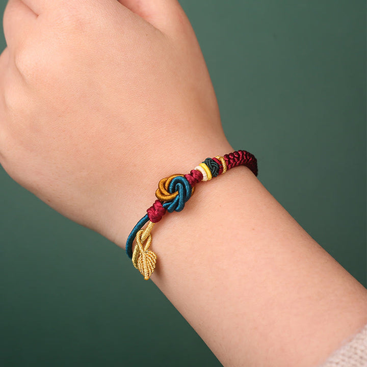 Pulsera de cuerda de la suerte con nudo de mandala hecha a mano tibetana con Buddha Stones
